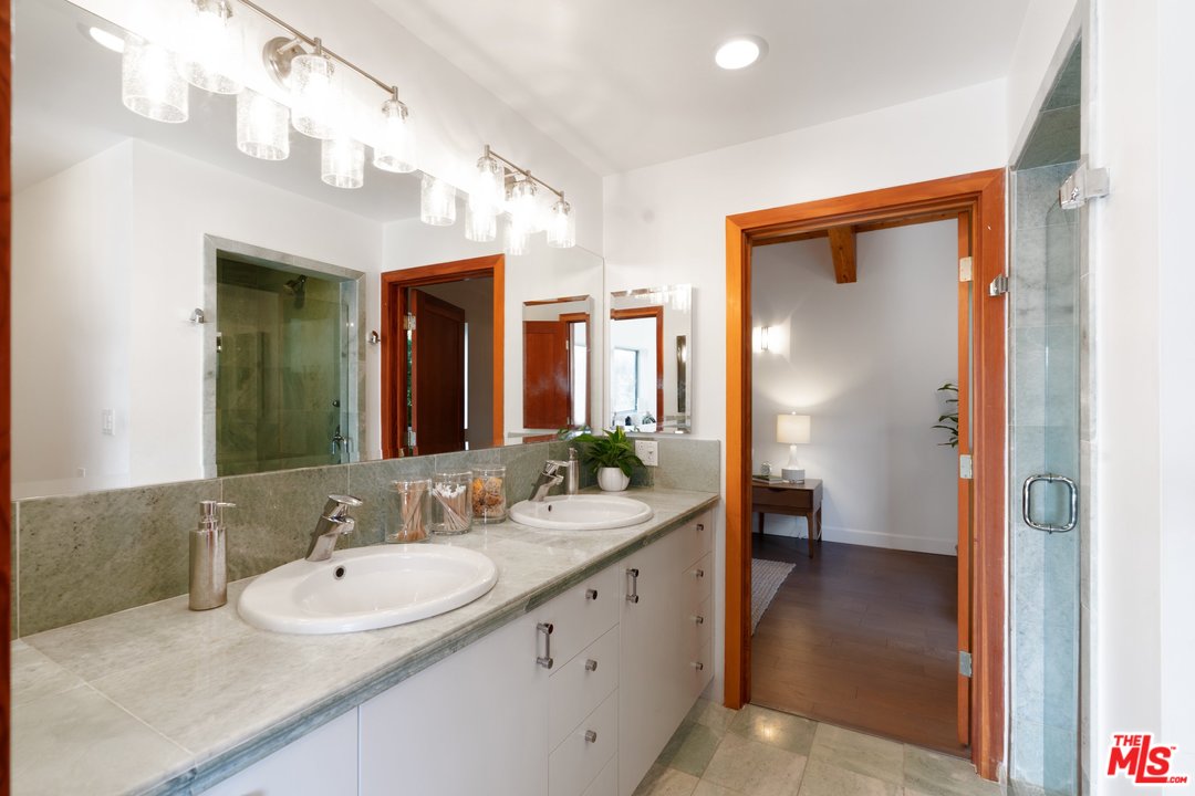 918 Howard Street Marina del Rey, CA 90292 - Photo 21 of 38 a bathroom with a sink and a mirror