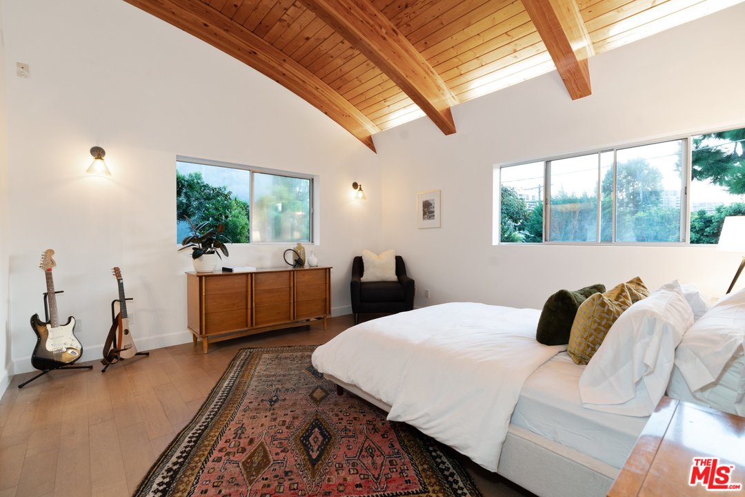 918 Howard Street Marina del Rey, CA 90292 - Photo 22 of 38 a bedroom with furniture and a large window