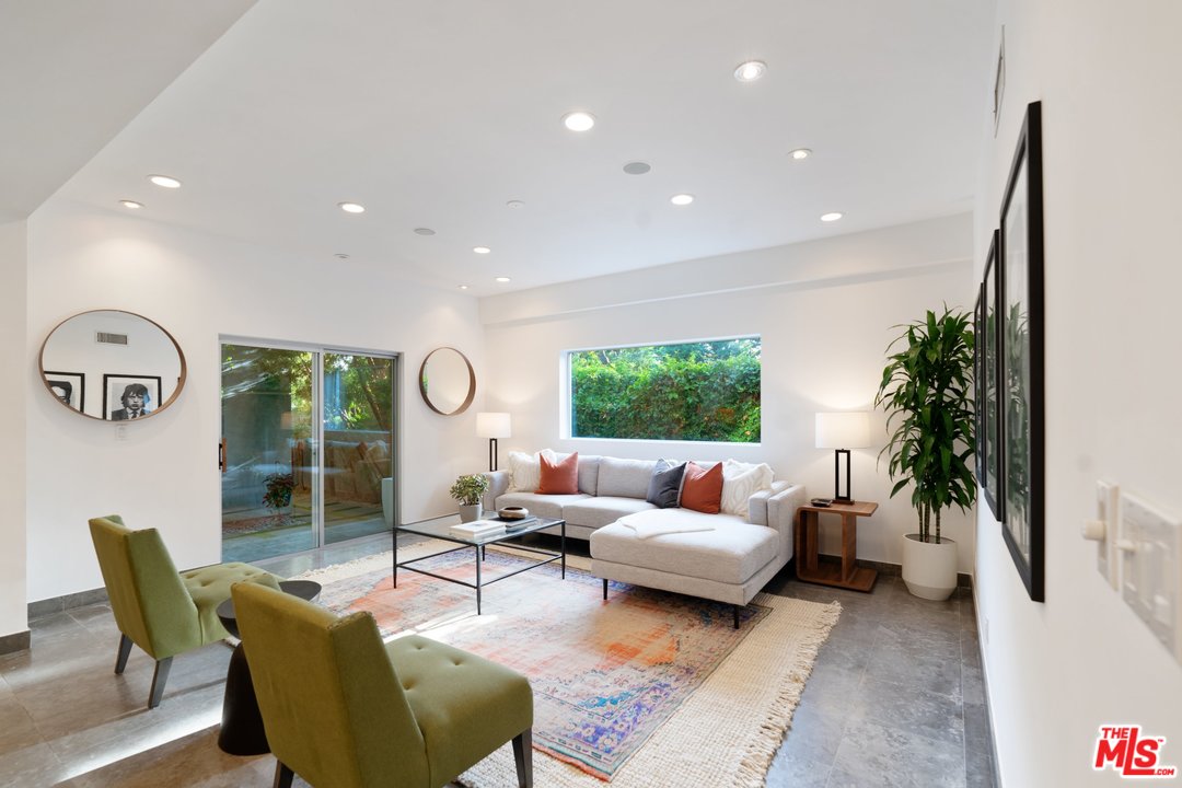 918 Howard Street Marina del Rey, CA 90292 - Photo 9 of 38 a living room with furniture and a large window