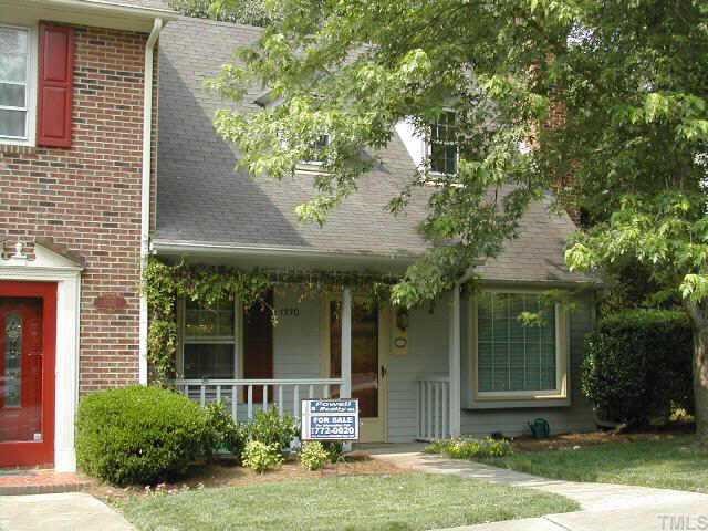1330 Dylan Heath Court Raleigh, NC 27608 - Photo 1 of 1 front view of house with a yard