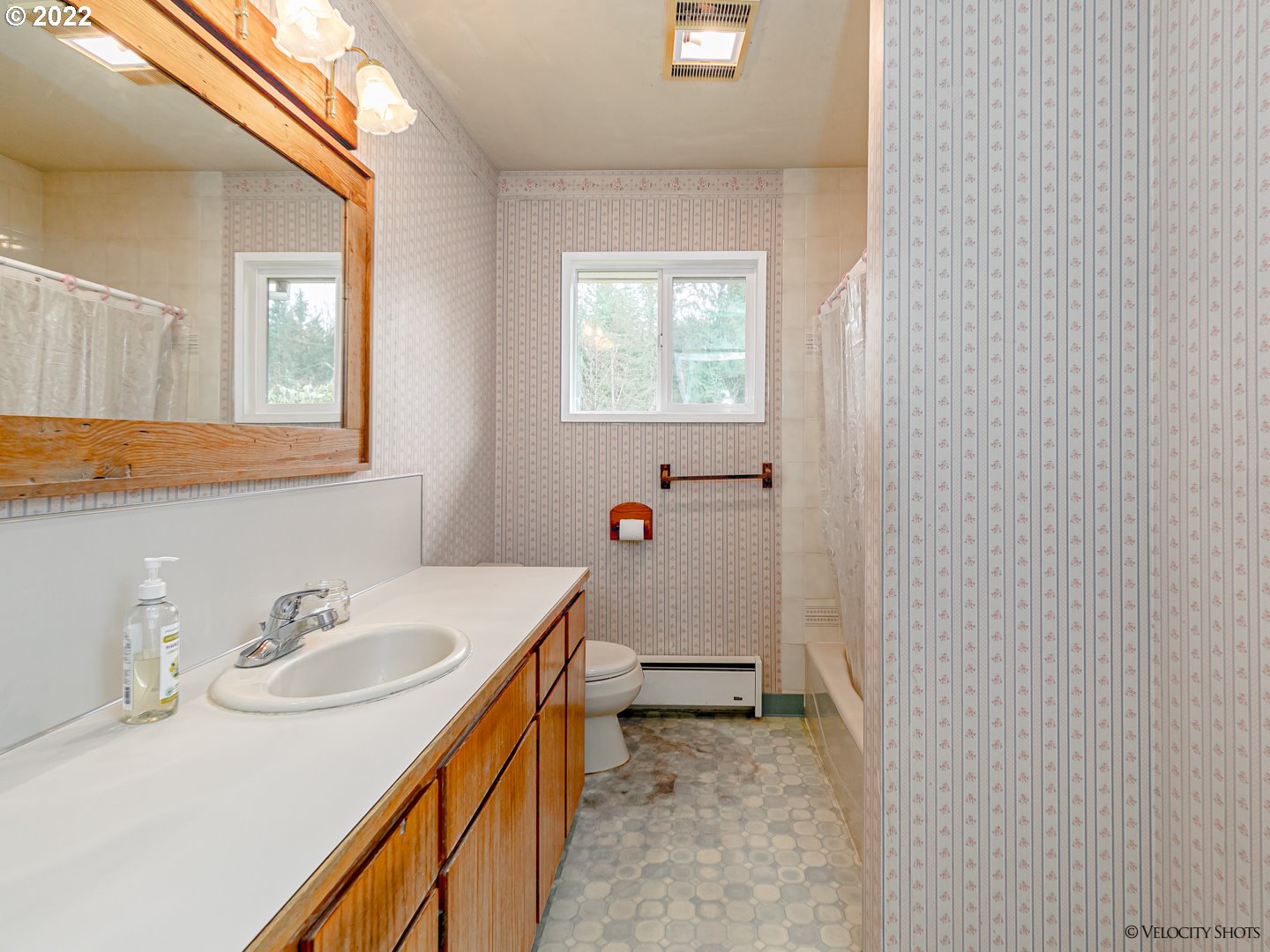 40050 Southeast Paul Moore Road Sandy, OR 97055 - Photo 13 of 32 a bathroom with a sink toilet and a mirror