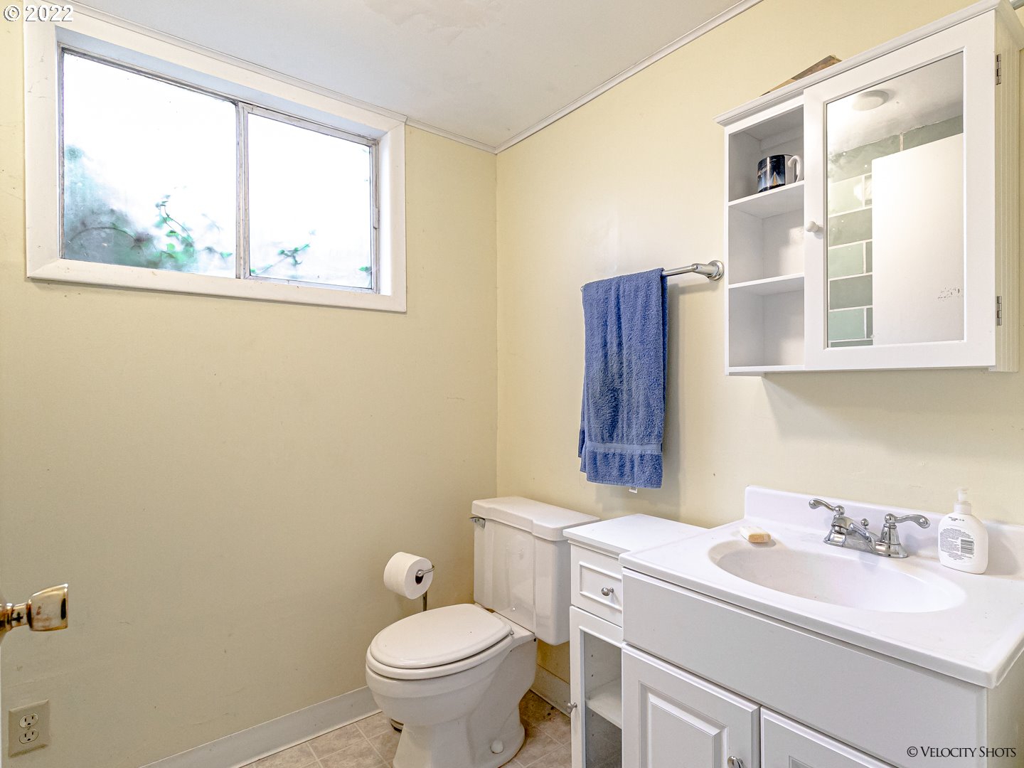 40050 Southeast Paul Moore Road Sandy, OR 97055 - Photo 16 of 32 a bathroom with a sink toilet and window