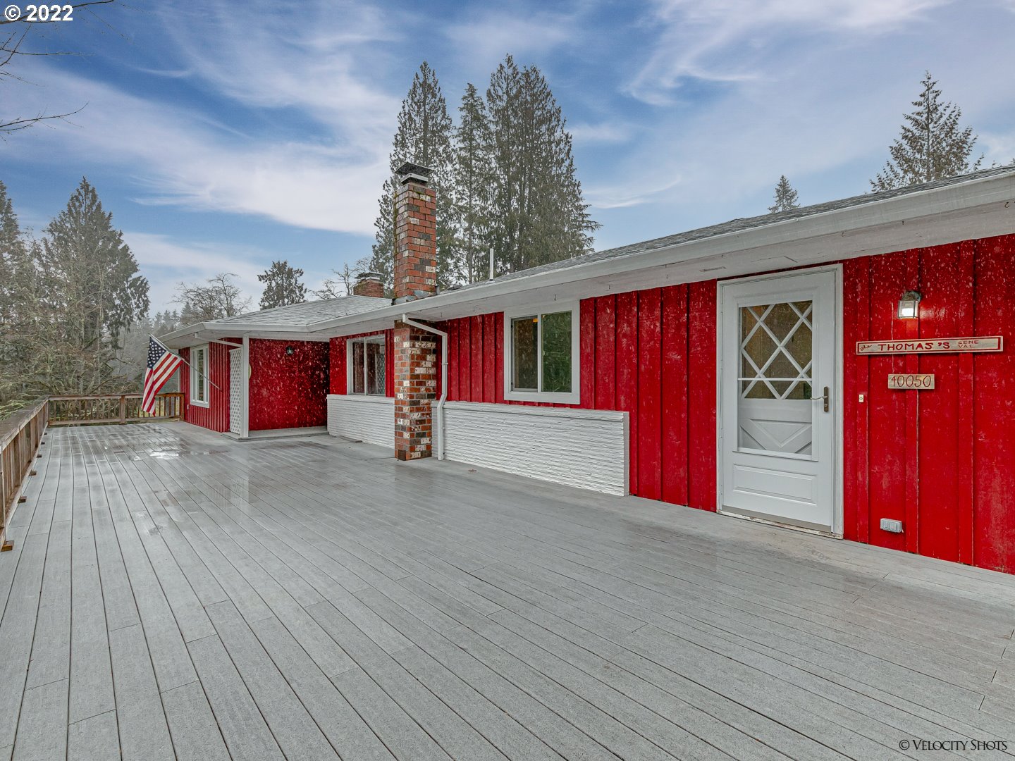 40050 Southeast Paul Moore Road Sandy, OR 97055 - Photo 2 of 32 a front view of a house with a yard
