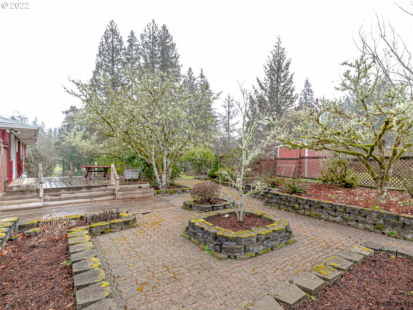 40050 Southeast Paul Moore Road Sandy, OR 97055 - Photo 30 of 32 a building with trees in the background