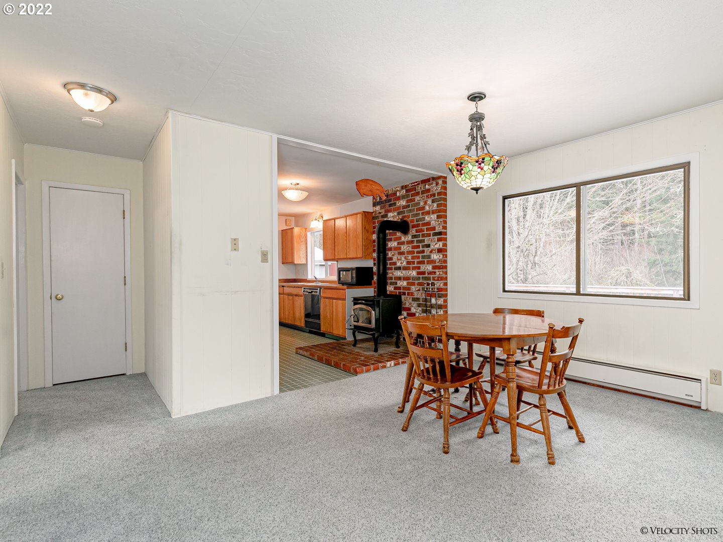 40050 Southeast Paul Moore Road Sandy, OR 97055 - Photo 7 of 32 a view of a dining room with furniture and window