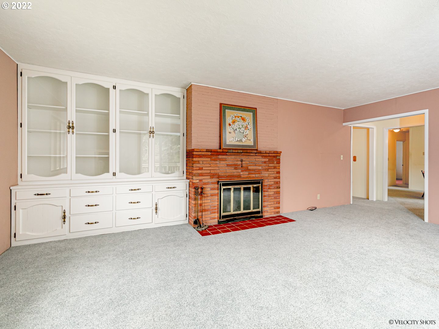 40050 Southeast Paul Moore Road Sandy, OR 97055 - Photo 9 of 32 an empty room with furniture and a fireplace
