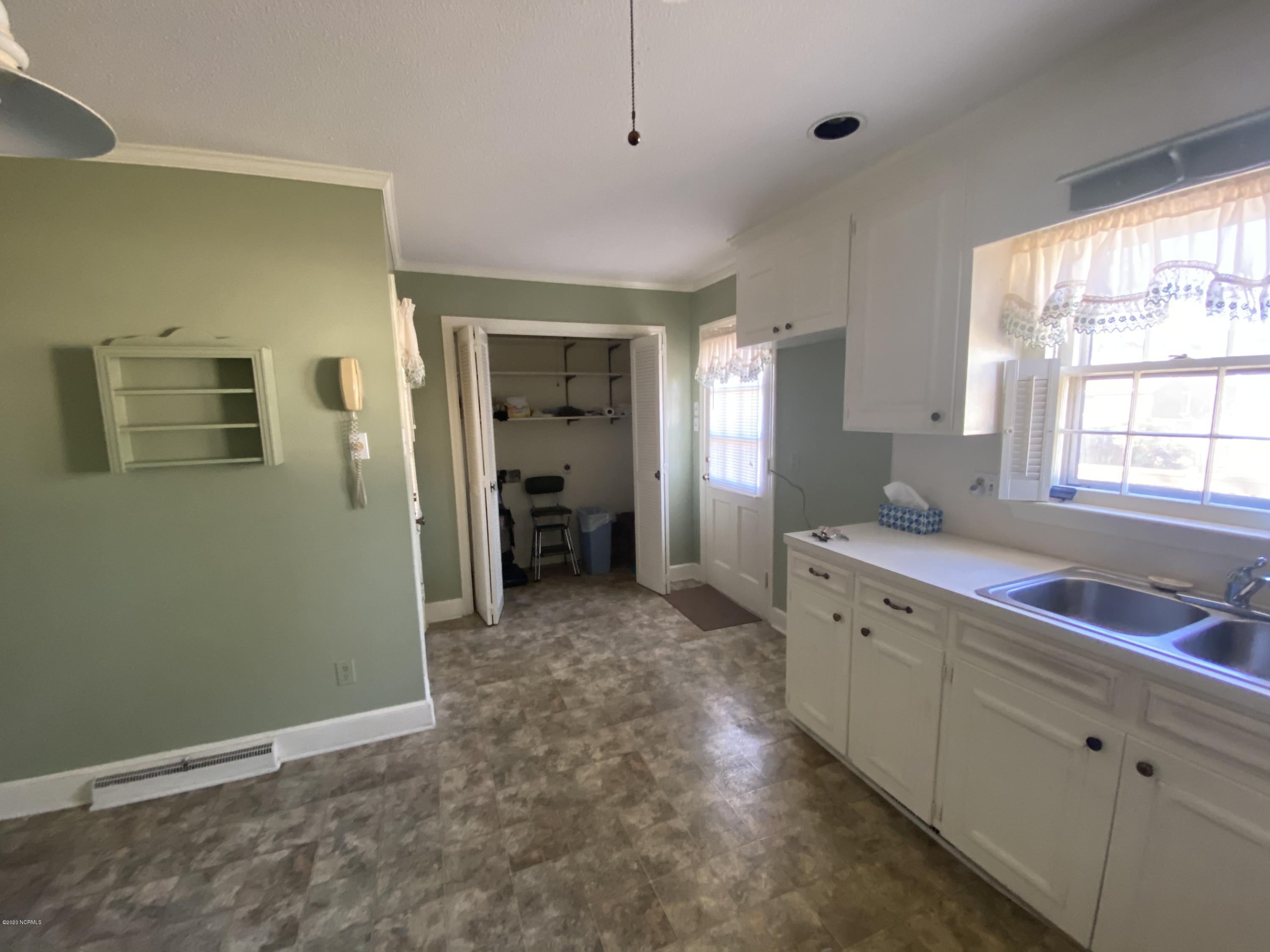 2308 Hardee Road Kinston, NC 28504 - Photo 5 of 23 Carport entrance- leading into the kitchen, washer/dryer hookups and the door leading to the back yard