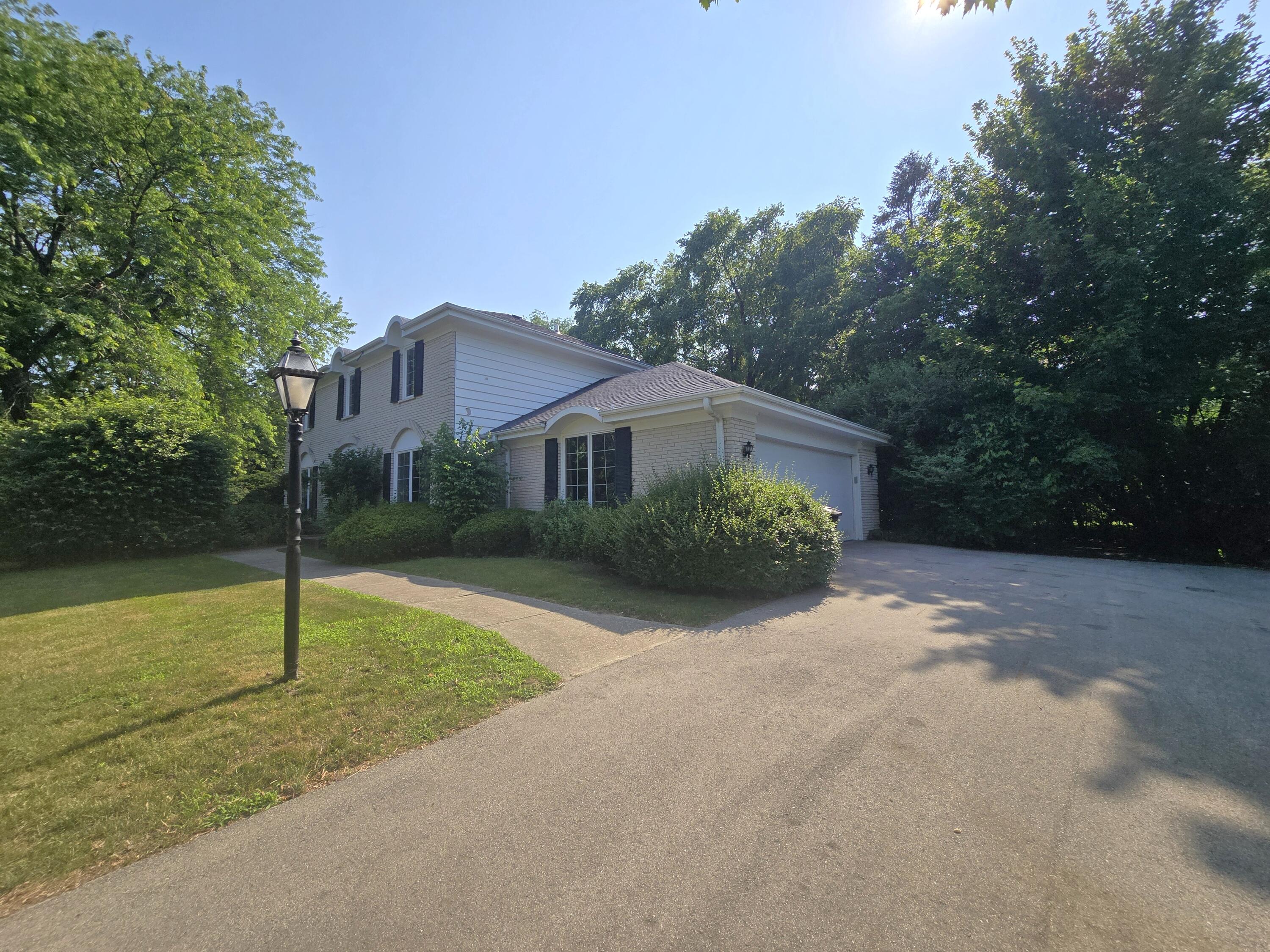 1 Birchwood Court Wind Point, WI 53402 - Photo 4 of 46 Driveway/Side Of Home