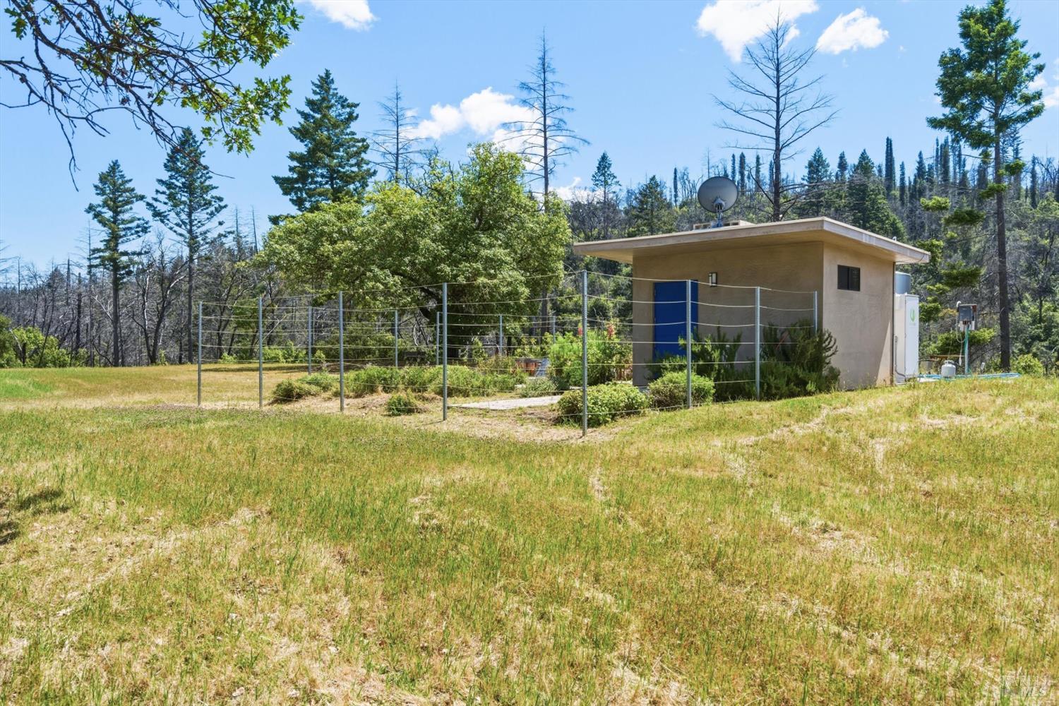 3444 Chicken Ridge Road Healdsburg, CA 95448 - Photo 7 of 21 a view of a house with a yard