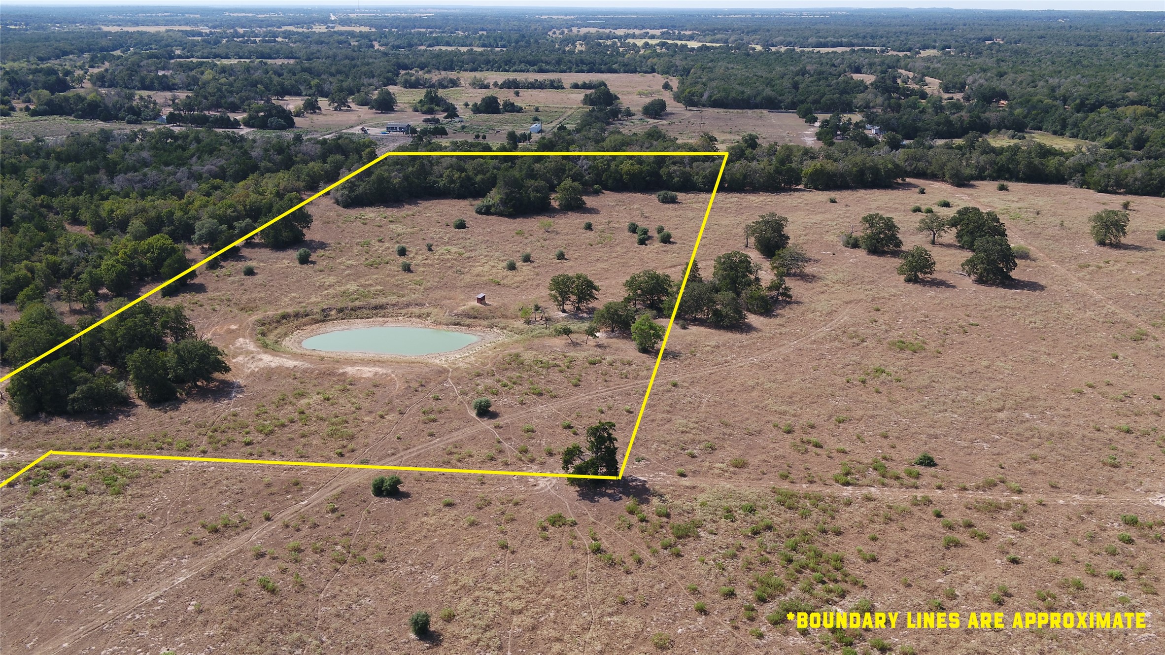 8 Cedar Rock Road Rosanky, TX 78953 - Photo 1 of 17 Aerial view of sparsely populated area featuring property boundaries highlighted