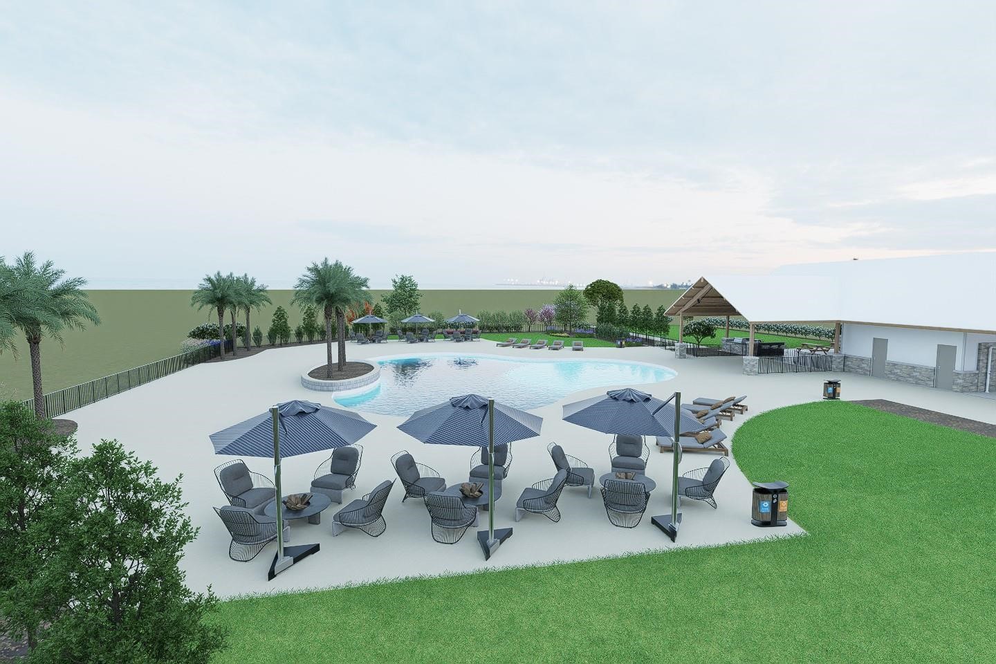 21111 Sunlight Grv Drive Rosharon, TX 77583 - Photo 6 of 7 a view of a lake with outdoor seating