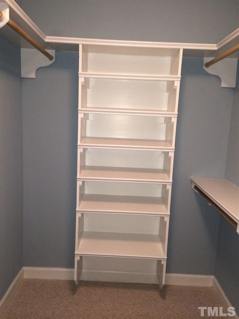 241 New Bern Place, Unit 301 Raleigh, NC 27601 - Photo 12 of 25 a view of an empty walk in closet