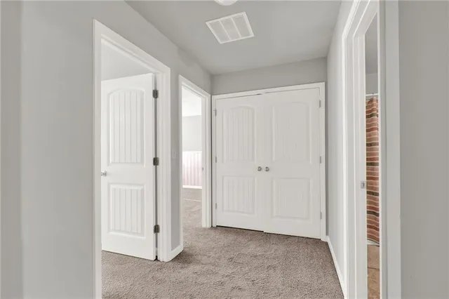 a workspace with furniture and chandelier