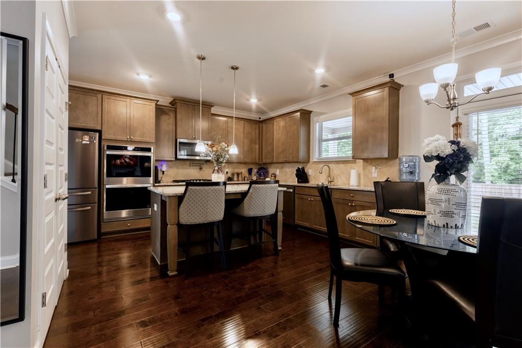 133 Canal Street Hampton, GA 30228 - Photo 13 of 43 a view of a dining room with furniture