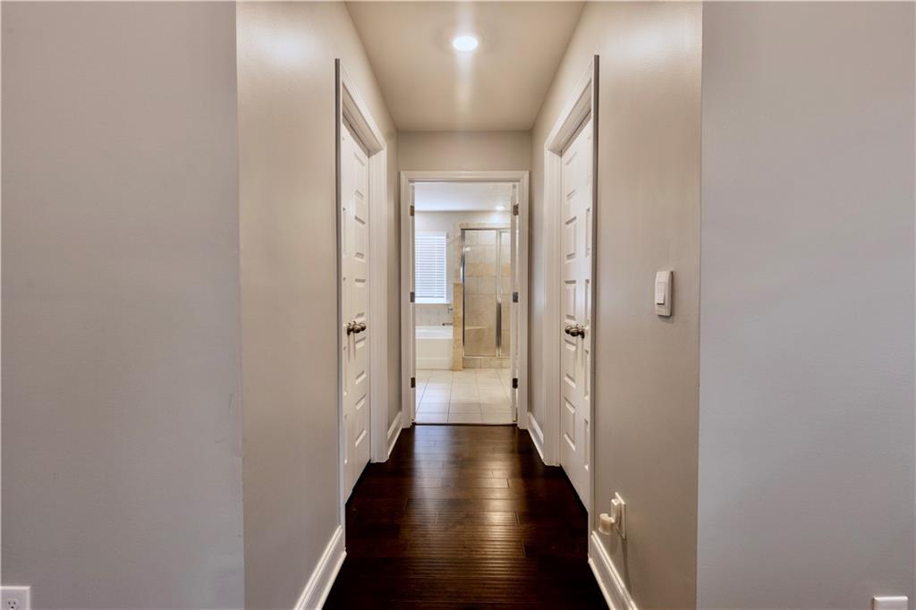 133 Canal Street Hampton, GA 30228 - Photo 28 of 43 a view of a hallway with wooden floor