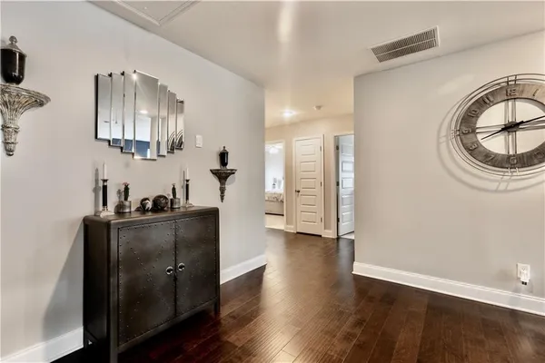 a kitchen with stainless steel appliances a refrigerator and a stove