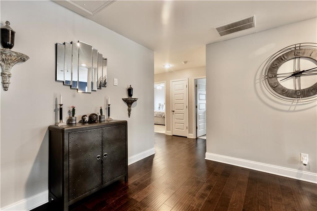 133 Canal Street Hampton, GA 30228 - Photo 36 of 43 a kitchen with stainless steel appliances a refrigerator and a stove