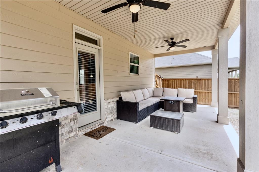 133 Canal Street Hampton, GA 30228 - Photo 42 of 43 a view of a livingroom with furniture and a ceiling fan