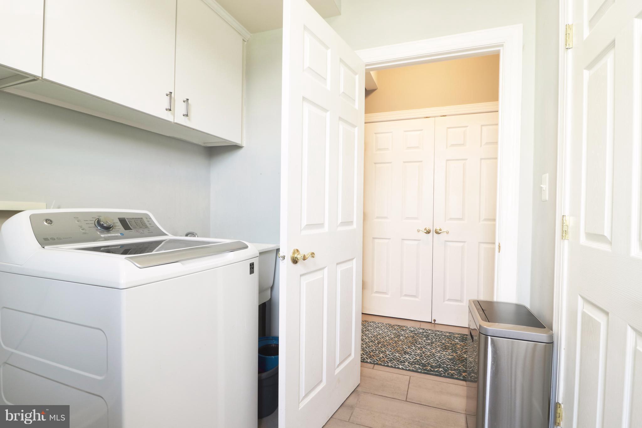 14406 Dunstable Court Bowie, MD 20721 - Photo 29 of 30 a utility room with dryer and washer