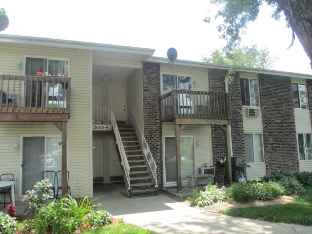 front view of a house with a small yard