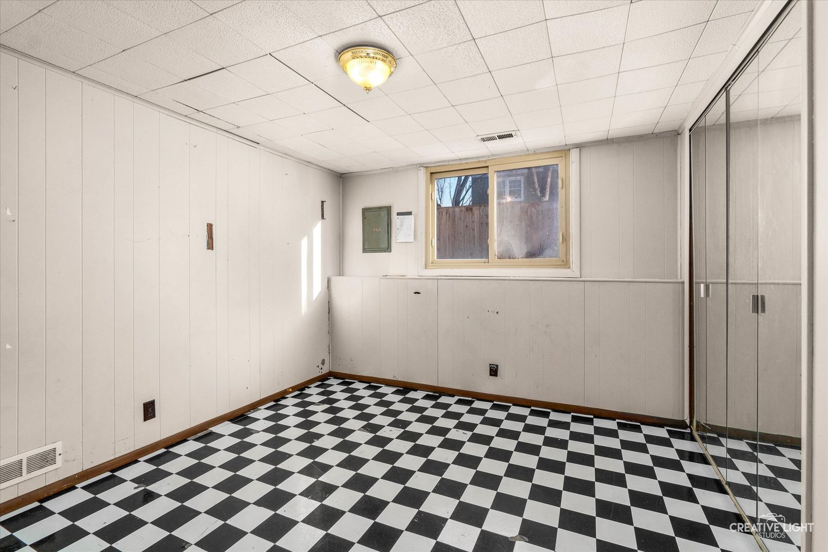 425 Carriage Hill Road Naperville, IL 60565 - Photo 23 of 37 a view of a room with a black white checkered floor