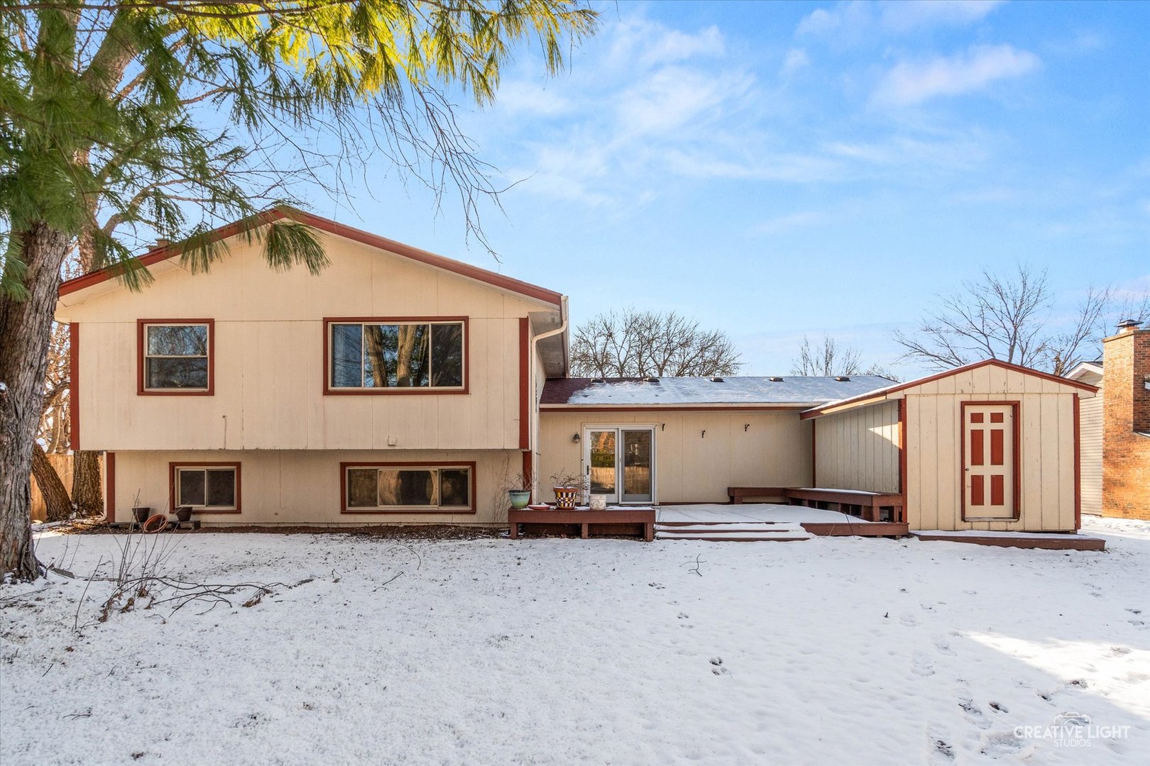 425 Carriage Hill Road Naperville, IL 60565 - Photo 26 of 37 a view of a backyard of the house