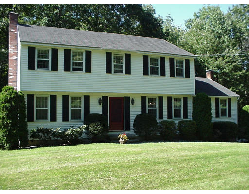 146 Scribner Road Tyngsborough, MA 01879 - Photo 1 of 1 a house that has a yard
