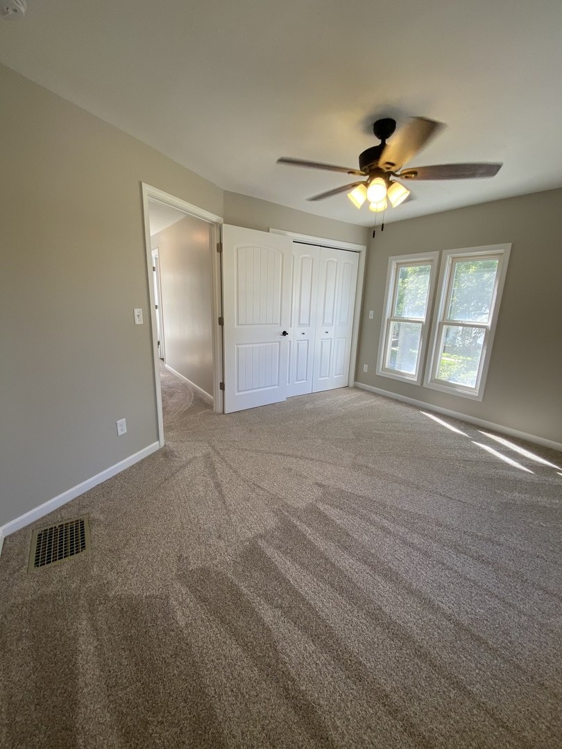 430 South 1st Street DeKalb, IL 60115 - Photo 28 of 34 a view of an empty room with a window