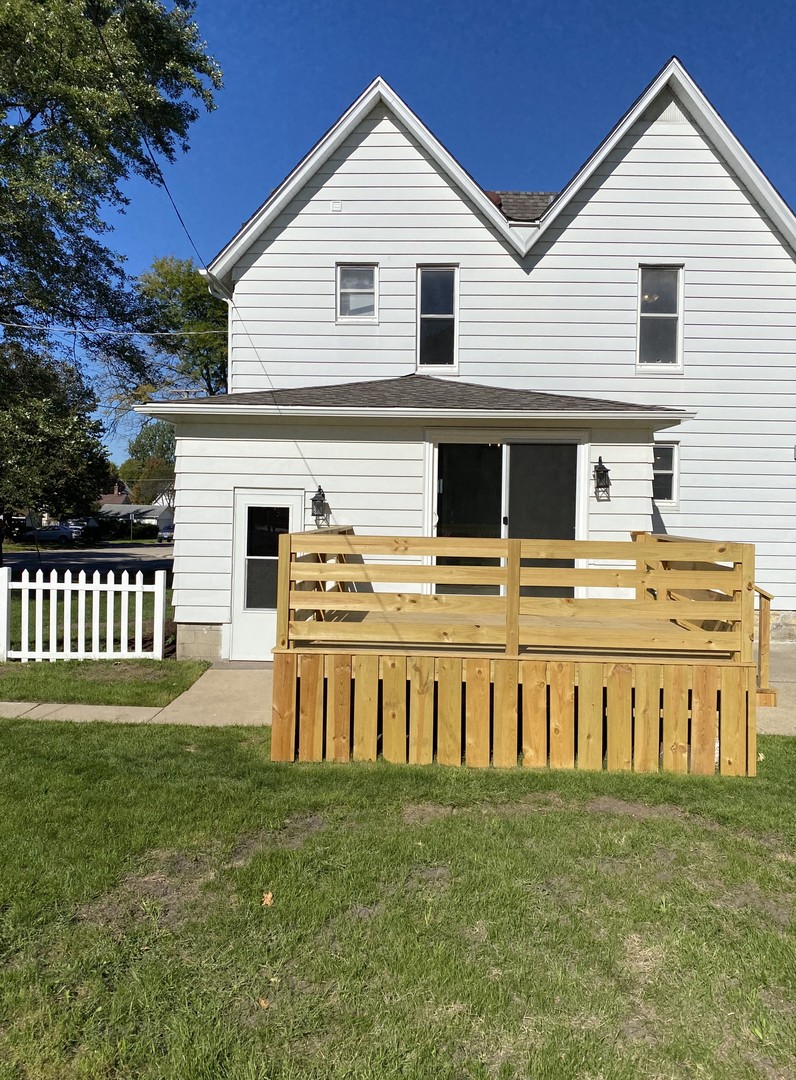 430 South 1st Street DeKalb, IL 60115 - Photo 33 of 34 a view of a house with a backyard
