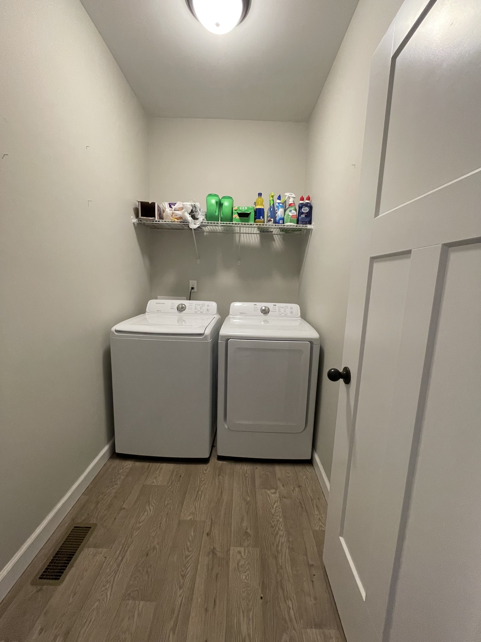 528 Matlock Road Charlotte, TN 37036 - Photo 23 of 26 a utility room with dryer and washer