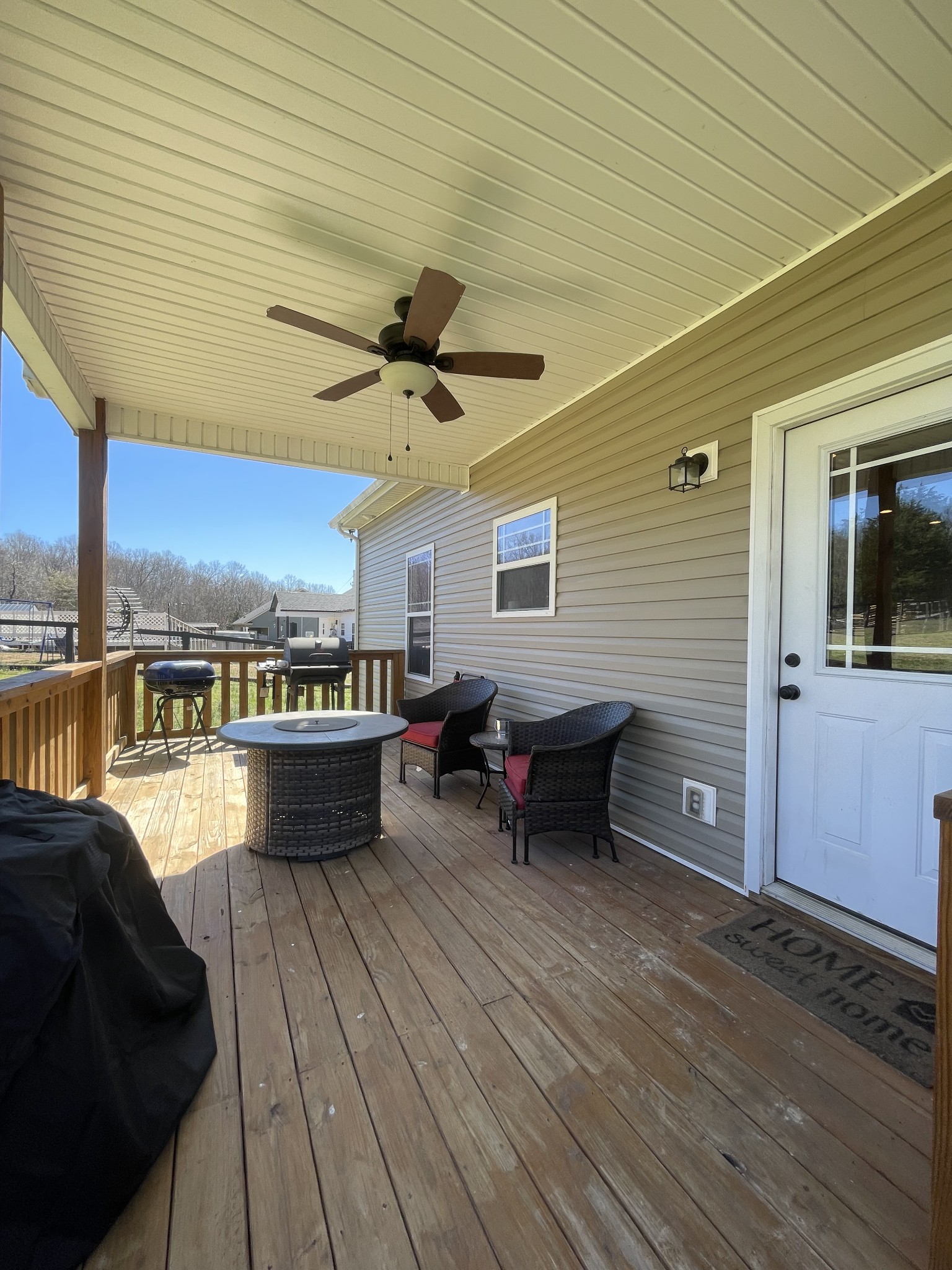 528 Matlock Road Charlotte, TN 37036 - Photo 10 of 26 a view of a terrace with wooden floor and outdoor seating