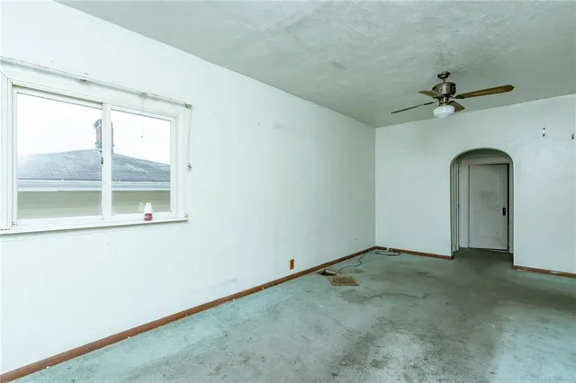 an empty room with windows