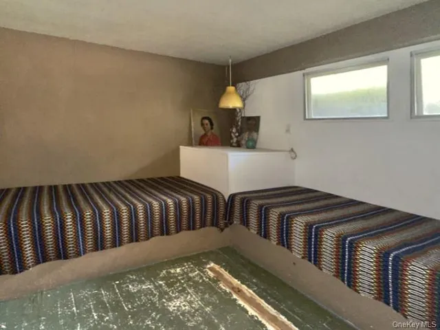 a view of bedroom with furniture