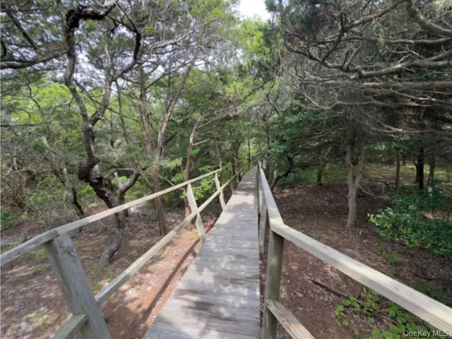 a view of balcony and yard