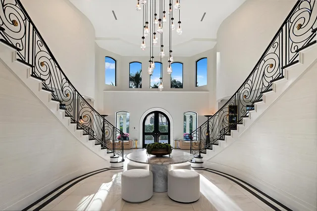a bathroom with a sink vanity granite toilet and a mirror