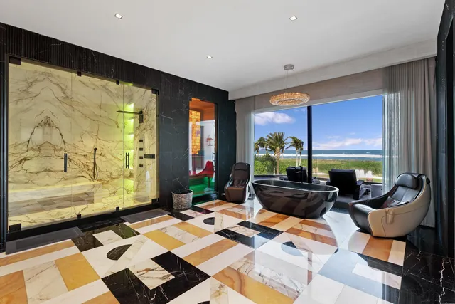 a en suite bathroom with a double vanity sink and a mirror