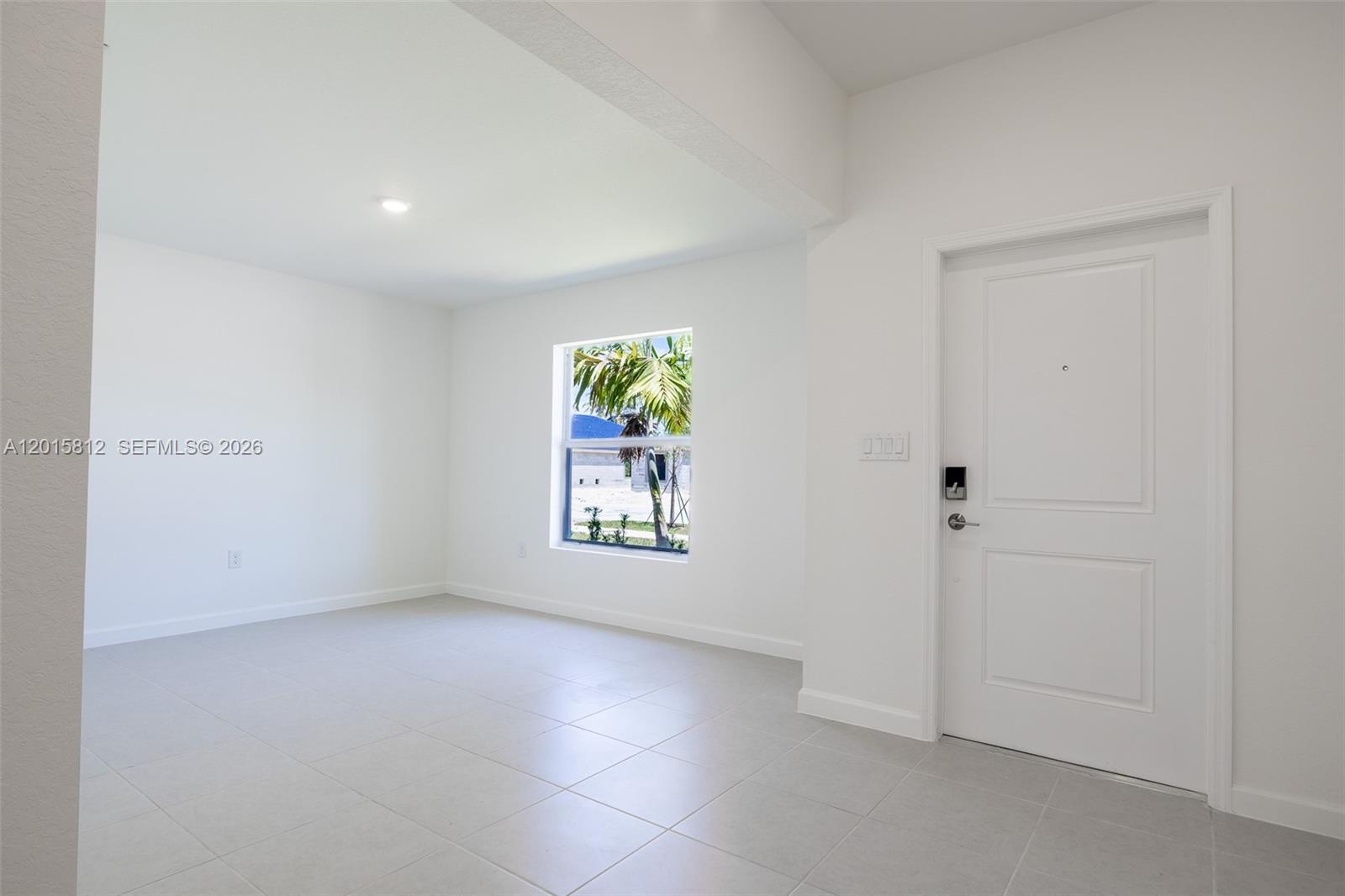 17564 Southwest 285th Street Homestead, FL 33030 - Photo 15 of 42 an empty room with windows