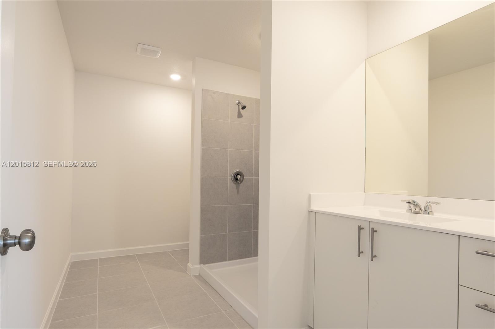17564 Southwest 285th Street Homestead, FL 33030 - Photo 20 of 42 a bathroom with a sink and shower