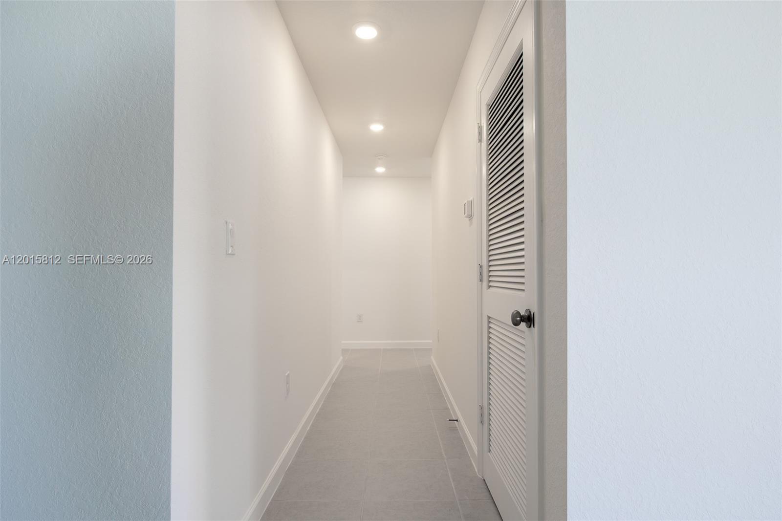 17564 Southwest 285th Street Homestead, FL 33030 - Photo 22 of 42 a view of a hallway
