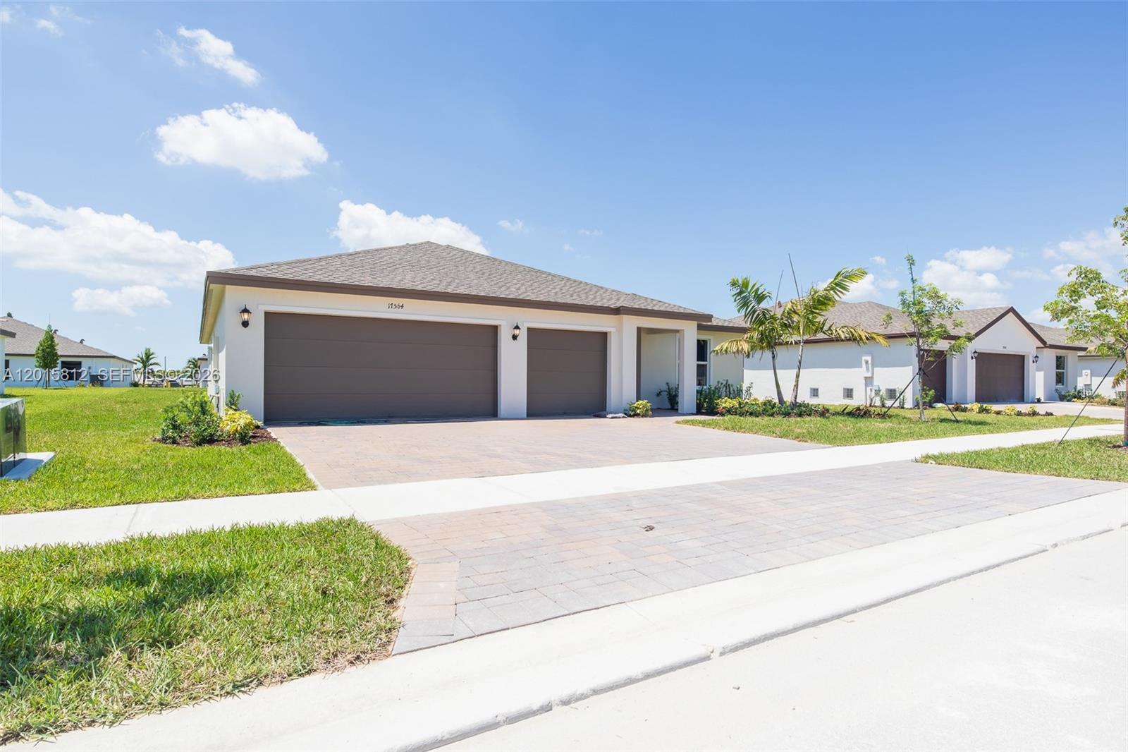 17564 Southwest 285th Street Homestead, FL 33030 - Photo 36 of 42 a front view of house with yard