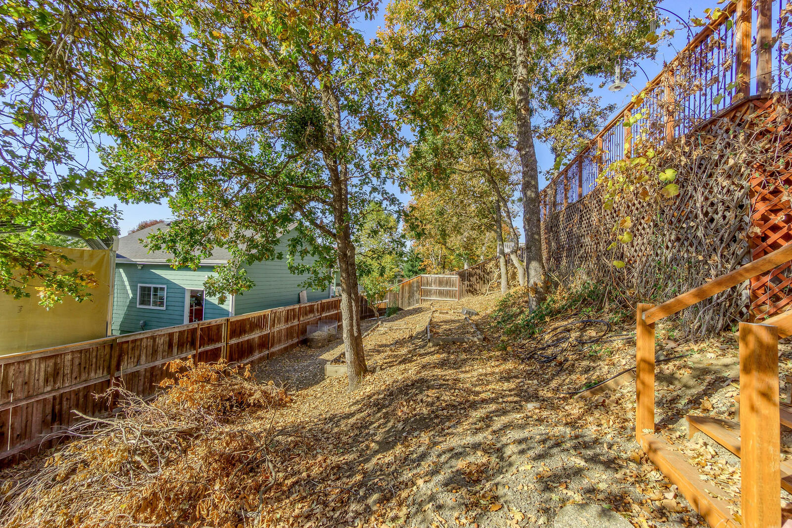 331 Ridgeway Avenue Central Point, OR 97502 - Photo 45 of 47 a view of a yard with wooden fence