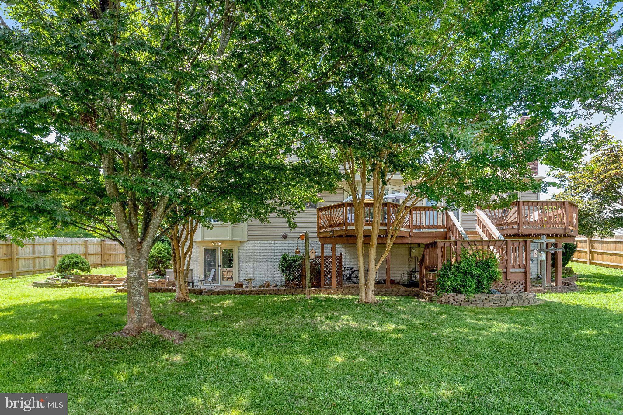 21 Burns Road Stafford, VA 22554 - Photo 26 of 35 Lush backyard oasis with shaded deck retreat.