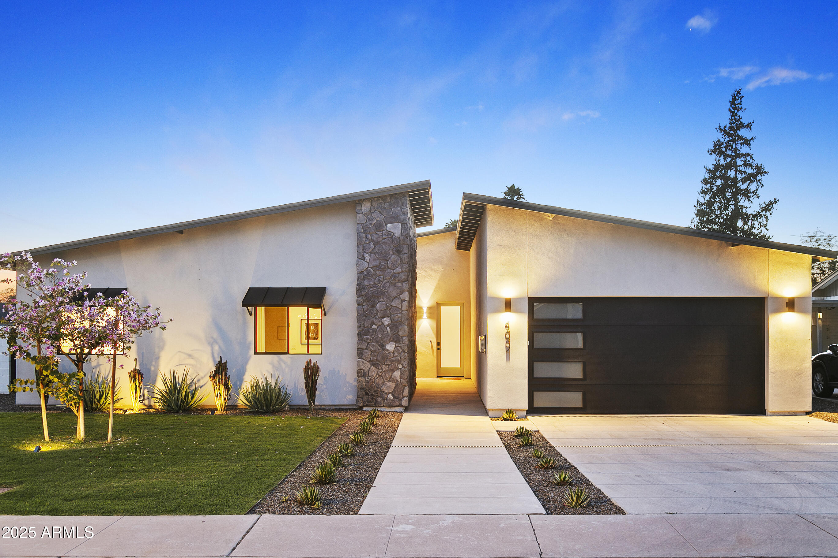 4002 North 33rd Place Phoenix, AZ 85018 - Photo 2 of 80 a front view of a house with a yard