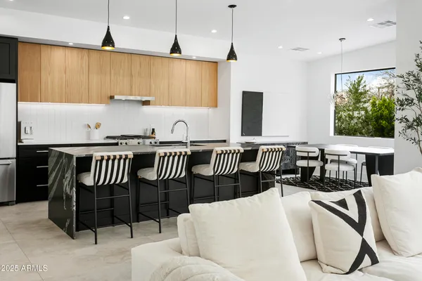 a en suite bathroom with a sink and a mirror