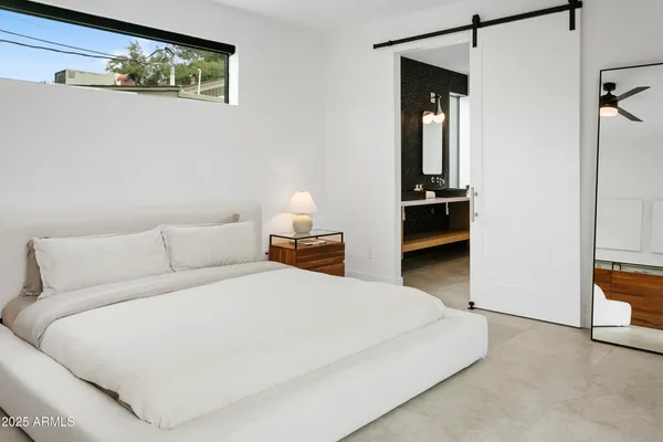 a room with gym equipment and a large window