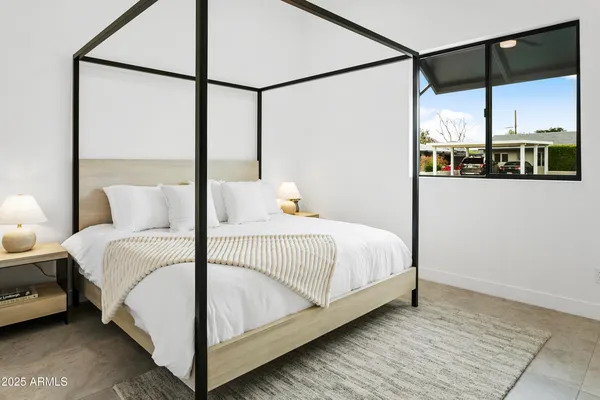 an aerial view of residential houses and outdoor space