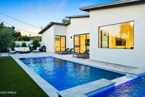 a front view of a house with garage