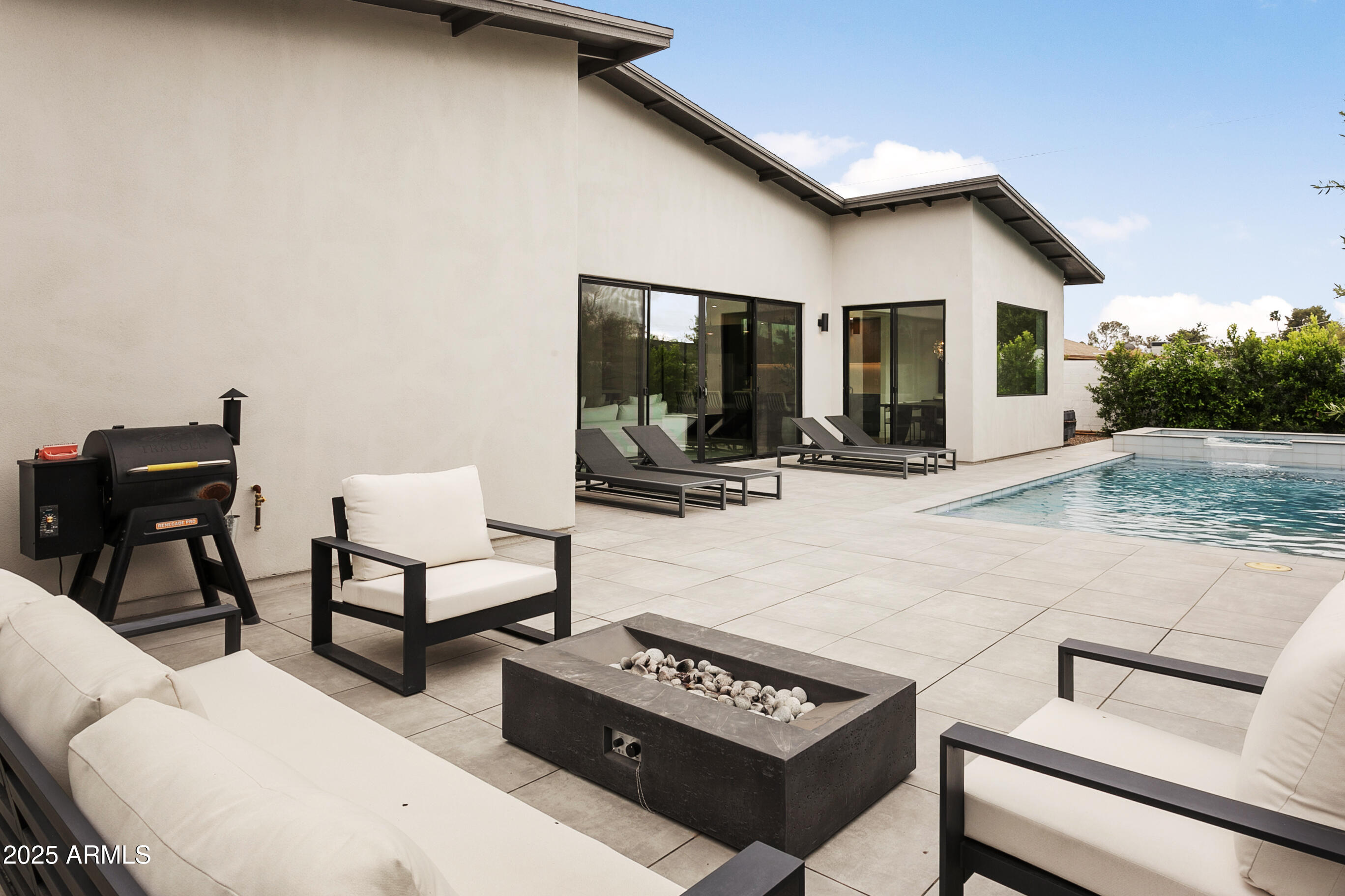 4002 North 33rd Place Phoenix, AZ 85018 - Photo 51 of 80 a view of a house with backyard and sitting area