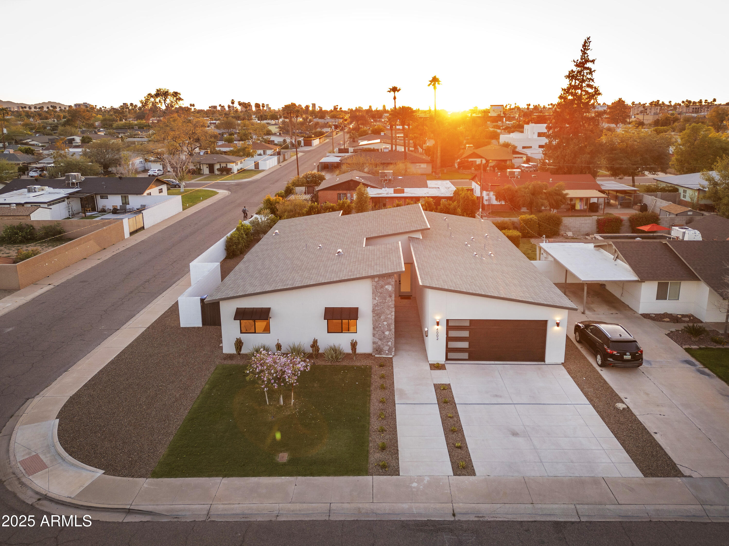 4002 North 33rd Place Phoenix, AZ 85018 - Photo 72 of 80 a view of a house with a yard