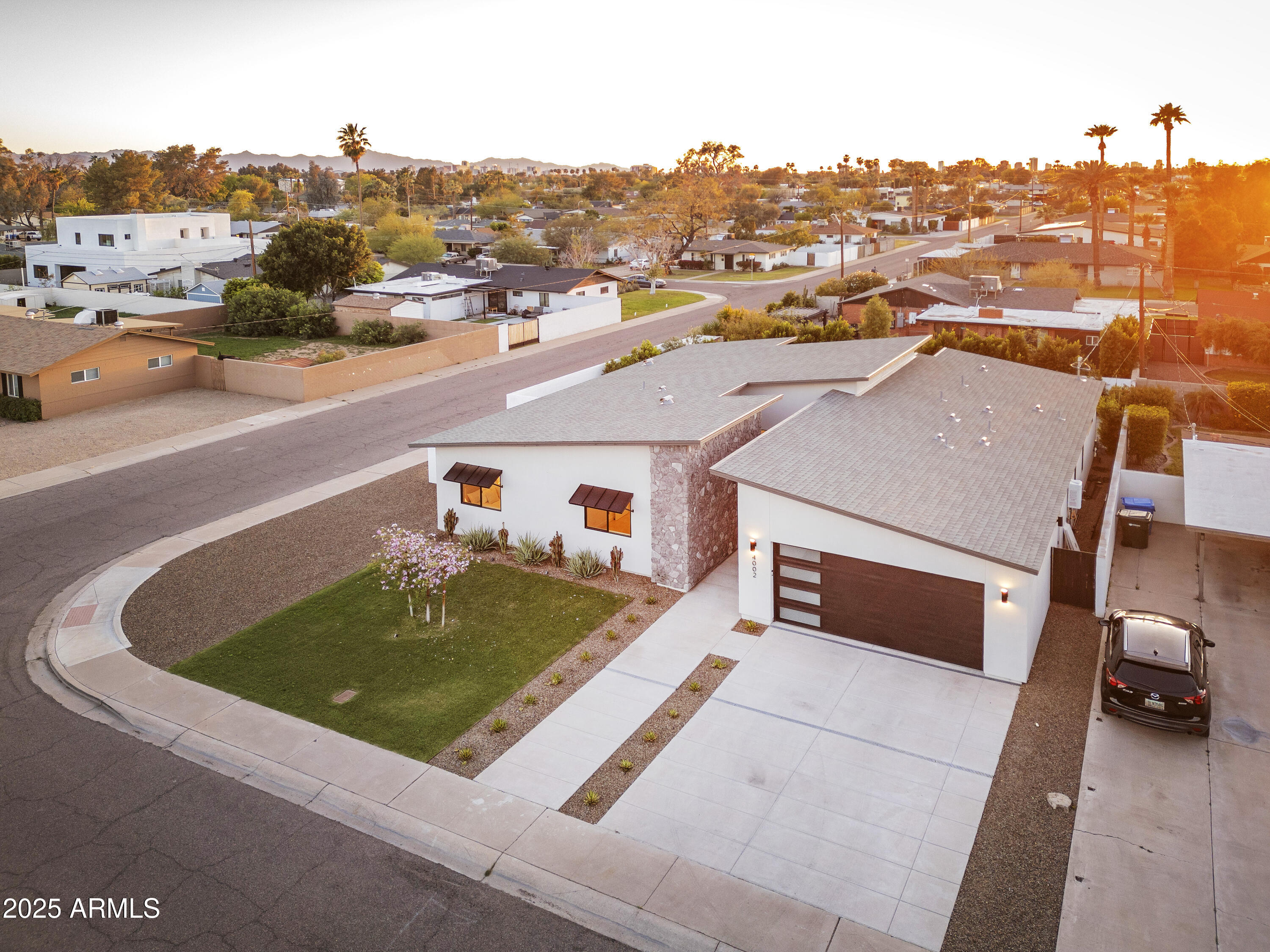 4002 North 33rd Place Phoenix, AZ 85018 - Photo 73 of 80 an aerial view of residential houses with outdoor space and parking